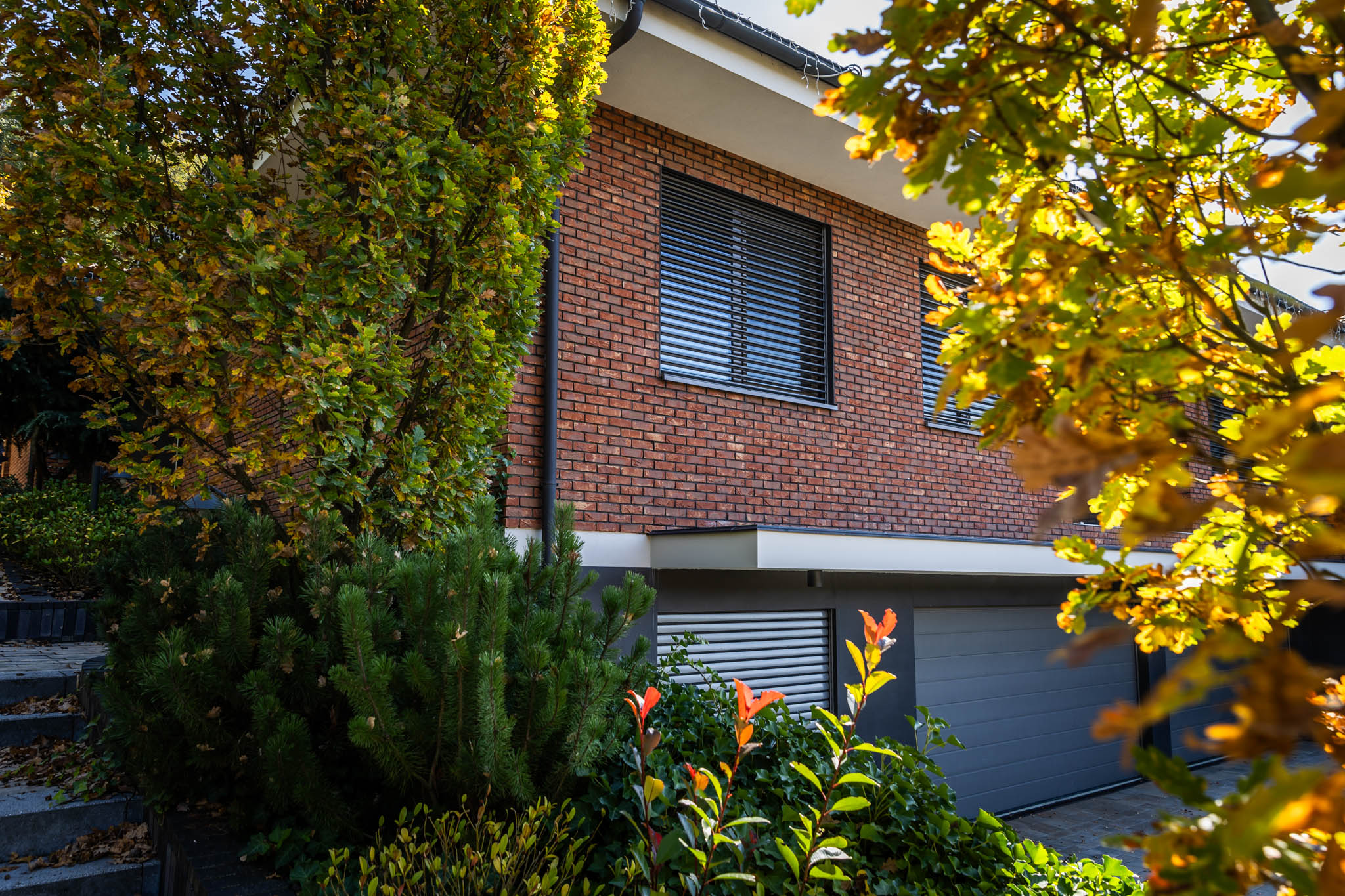 Tehlový obklad Oranje donker na fasáde rodinného domu od Rustique.sk