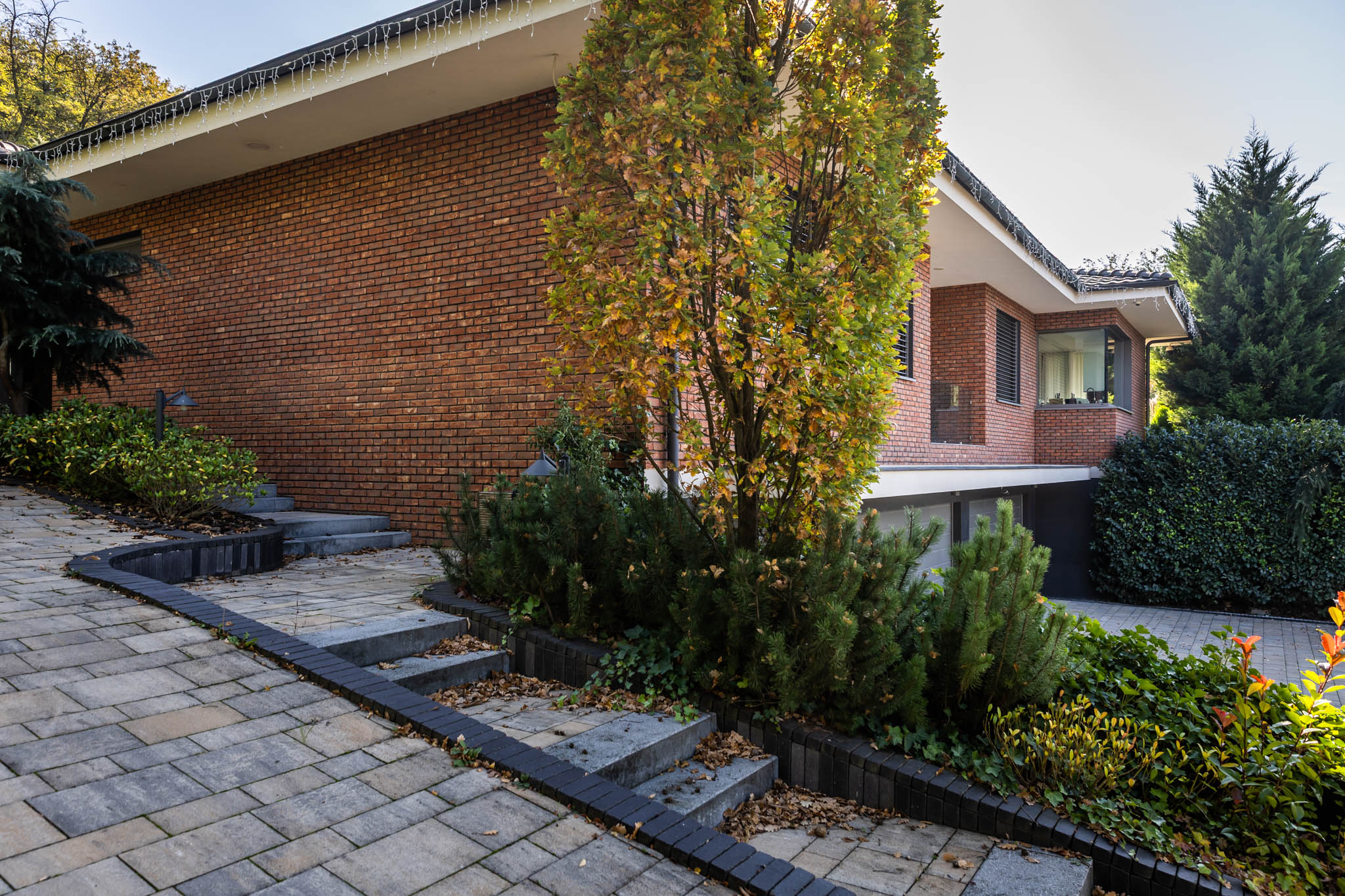 Tehlový obklad Oranje donker na fasáde rodinného domu od Rustique.sk