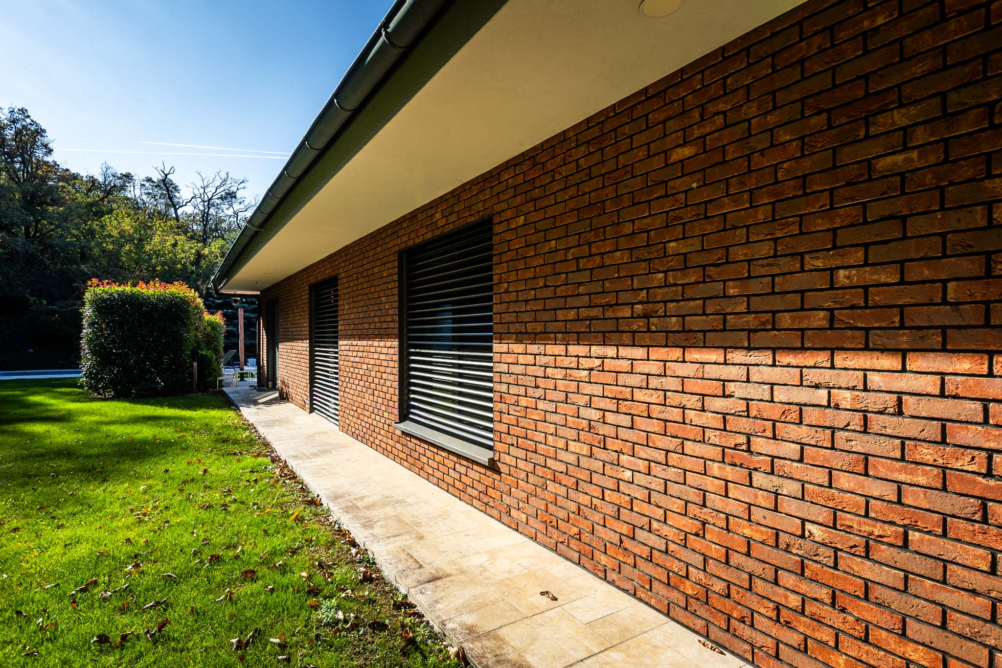 Tehlový obklad Oranje donker na fasáde rodinného domu od Rustique.sk