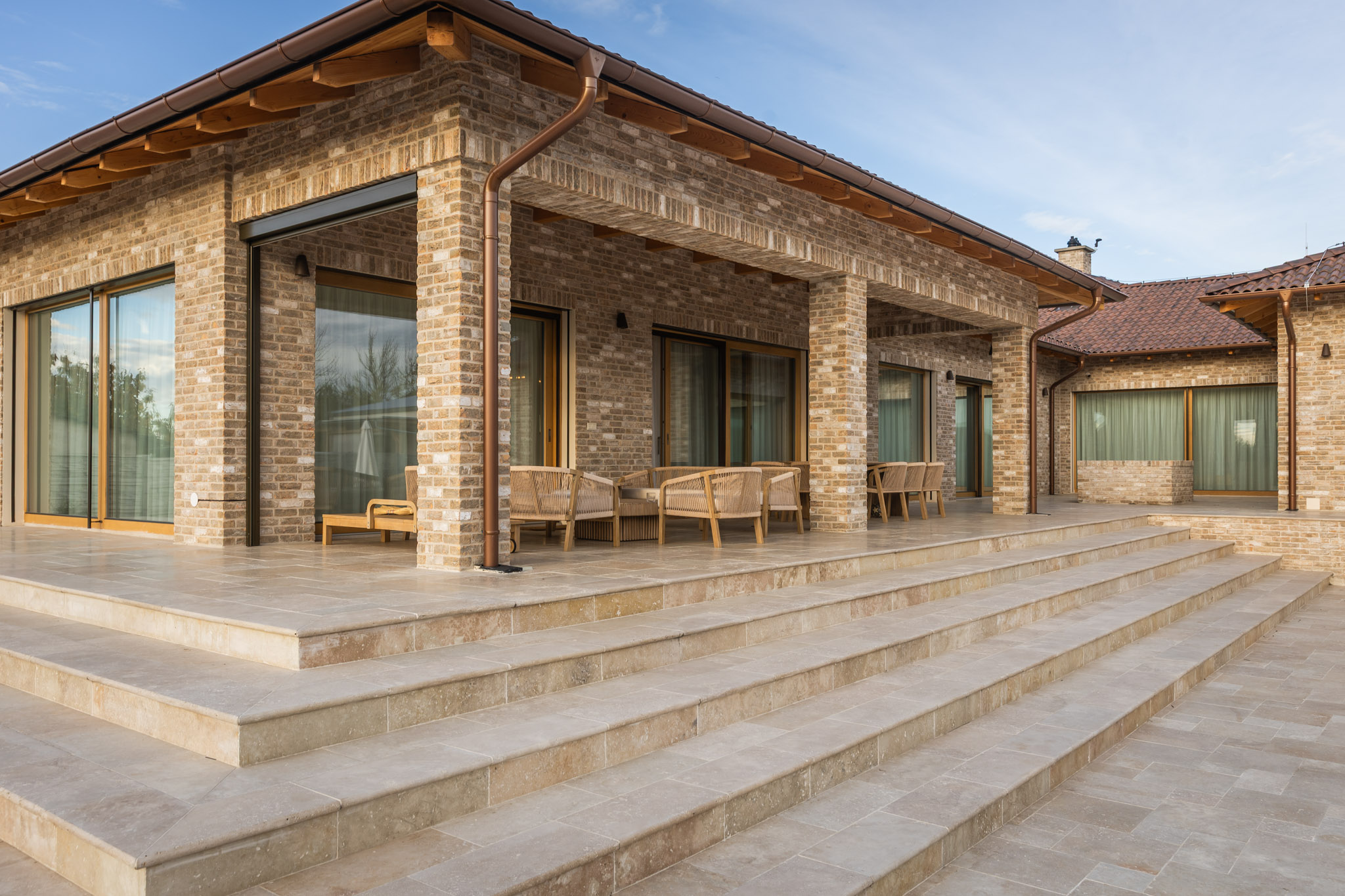 Tehlový obklad Toscane antiek na fasáde rodinného domu od Rustique.sk