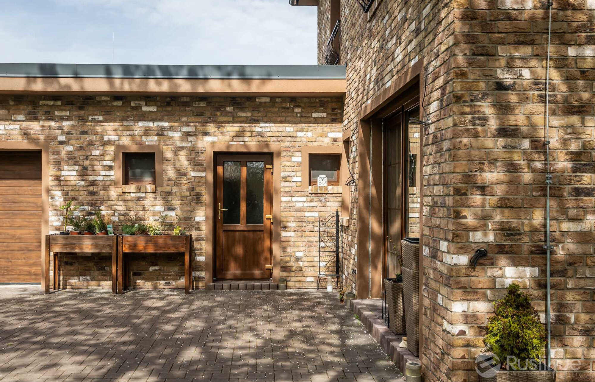 Tehlový obklad Antiekbruin na fasáde rodinného domu