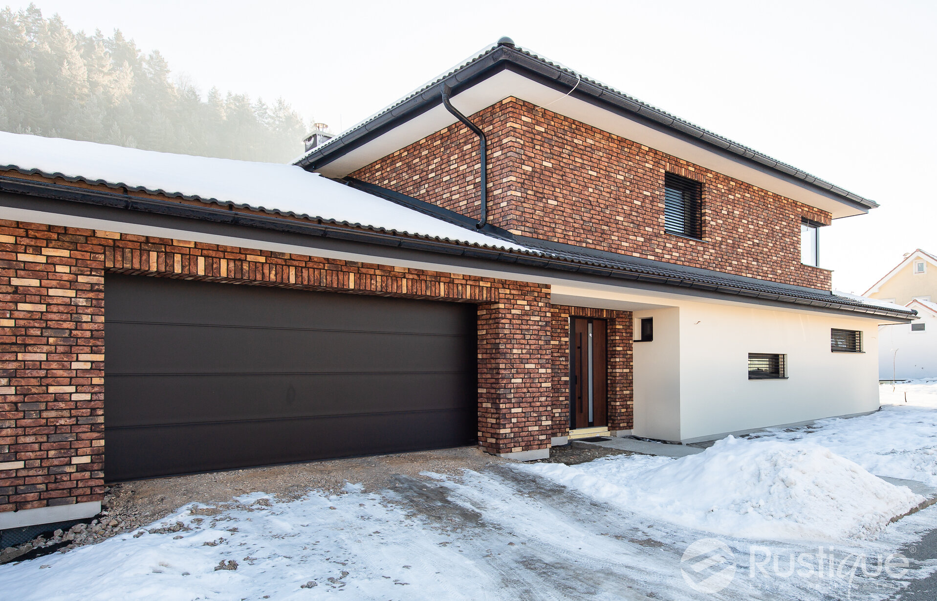 Kombinácia tehlového obkladu Autumn a Eisa na fasáde rodinného domu od Rustique.sk