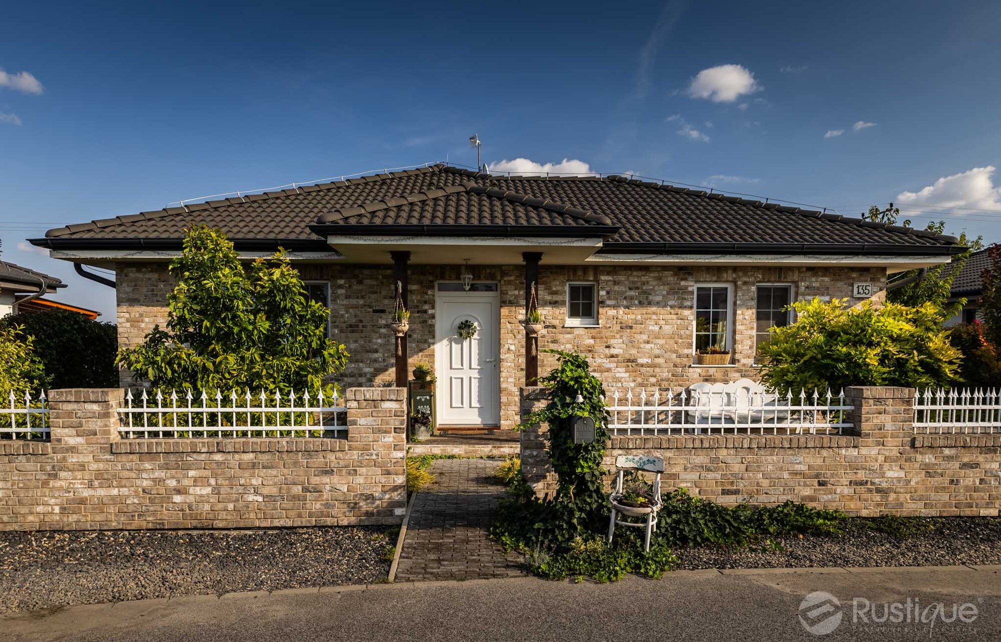 Tehlový obklad Hubertus na fasáde a na plote rodinného domu
