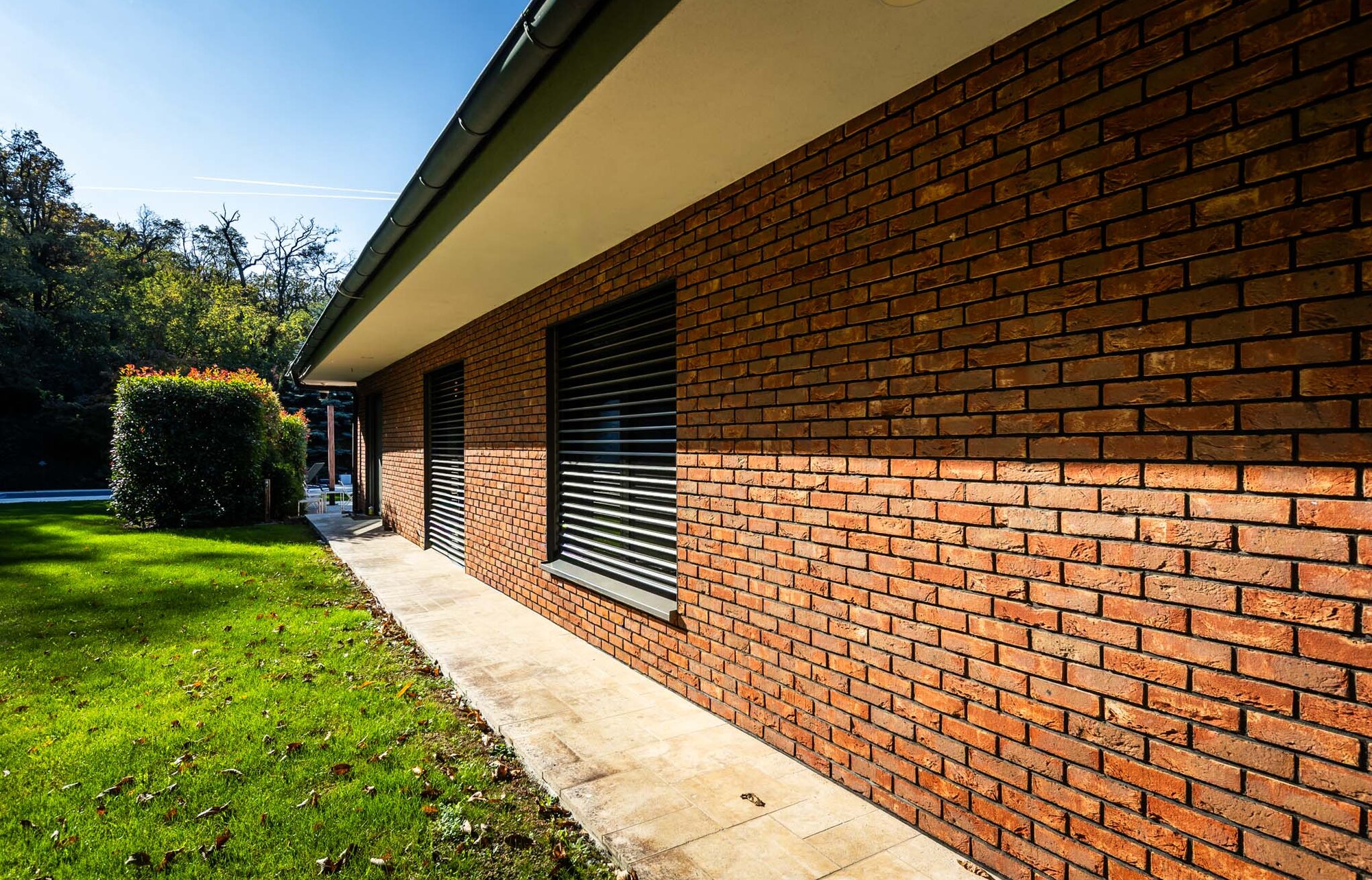 Tehlový obklad Oranje donker na fasáde rodinného domu od Rustique.sk
