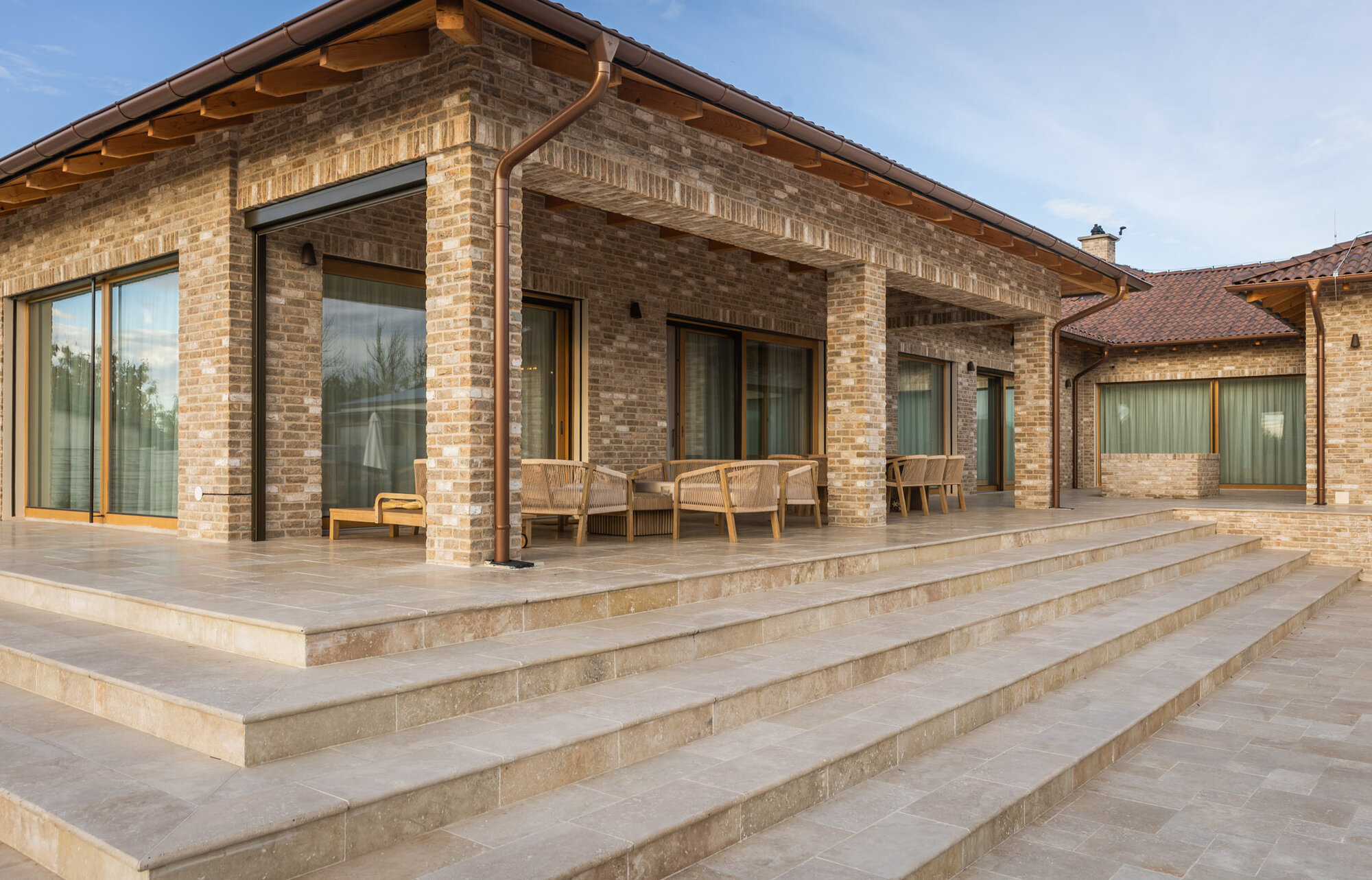 Tehlový obklad Toscane antiek na fasáde rodinného domu od Rustique.sk