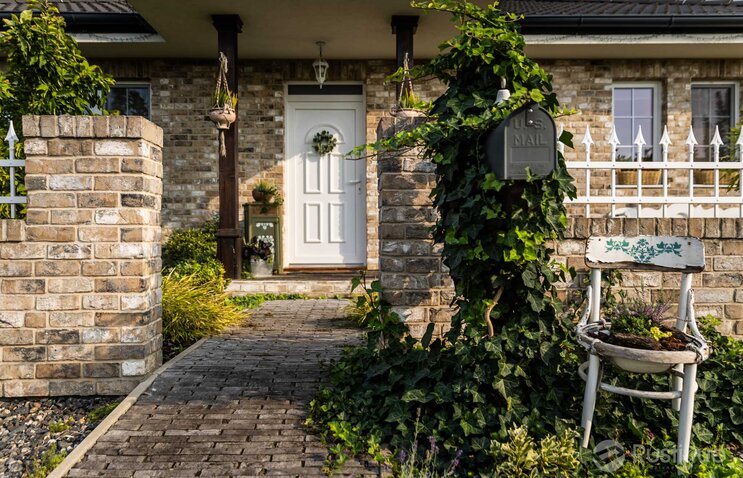 Tehlový obklad Hubertus na fasáde a na plote rodinného domu