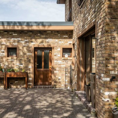 Tehlový obklad Antiekbruin na fasáde rodinného domu