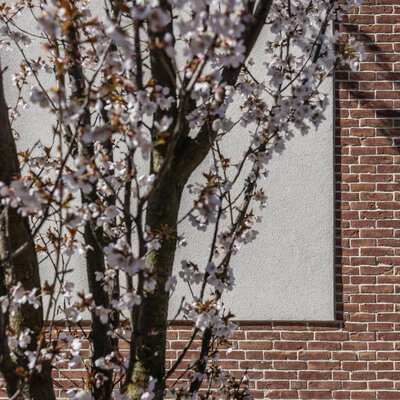 Tehlový obklad Carmine genuancierd na fasáde rodinného domu od Rustique.sk