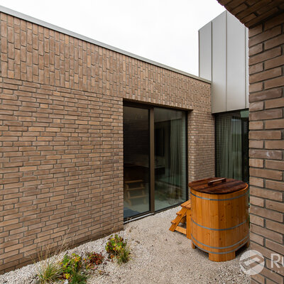 Tehlový obklad Grisea Smook na fasáde rodinného domu od Rustique.sk