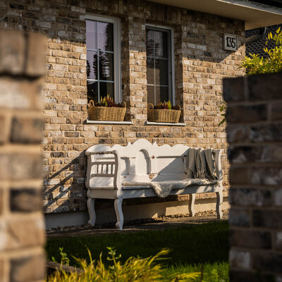 Tehlový obklad Hubertus na fasáde a na plote rodinného domu
