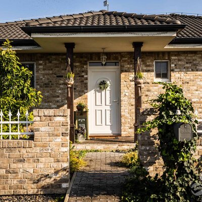 Tehlový obklad Hubertus na fasáde a na plote rodinného domu