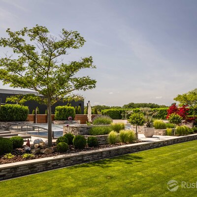 Rodinný dom s tehlovým obkladom London Dark na fasáde, múrikoch a plote