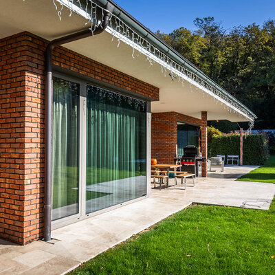 Tehlový obklad Oranje donker na fasáde rodinného domu od Rustique.sk