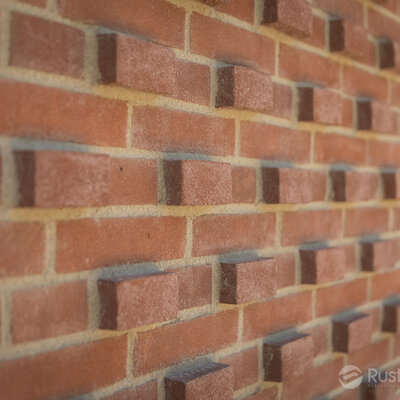 Tehlový obklad Rosso rose na fasáde polyfunkčnej budovy Zwirn