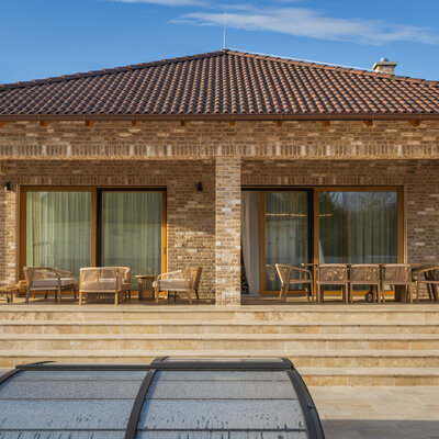 Tehlový obklad Toscane antiek na fasáde rodinného domu od Rustique.sk