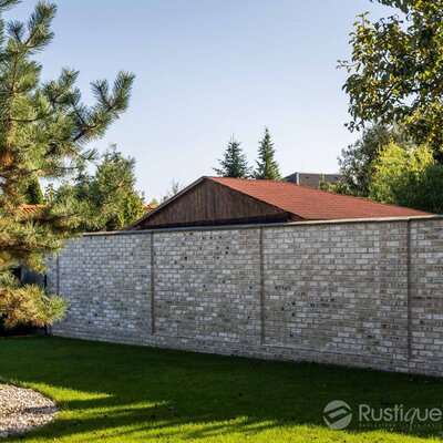 Tehlový obklad Vuurwit na fasáde a na plote rodinného domu