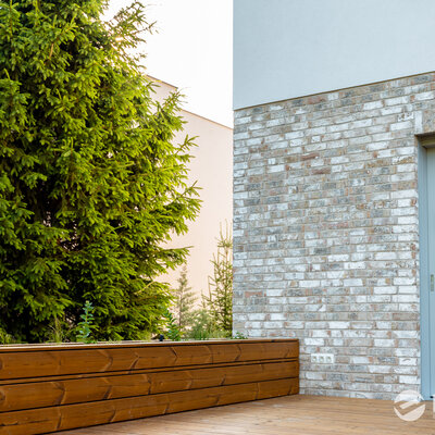 tehlový obklad Wit Beige na fasáde rodinného domu od Rustique.sk